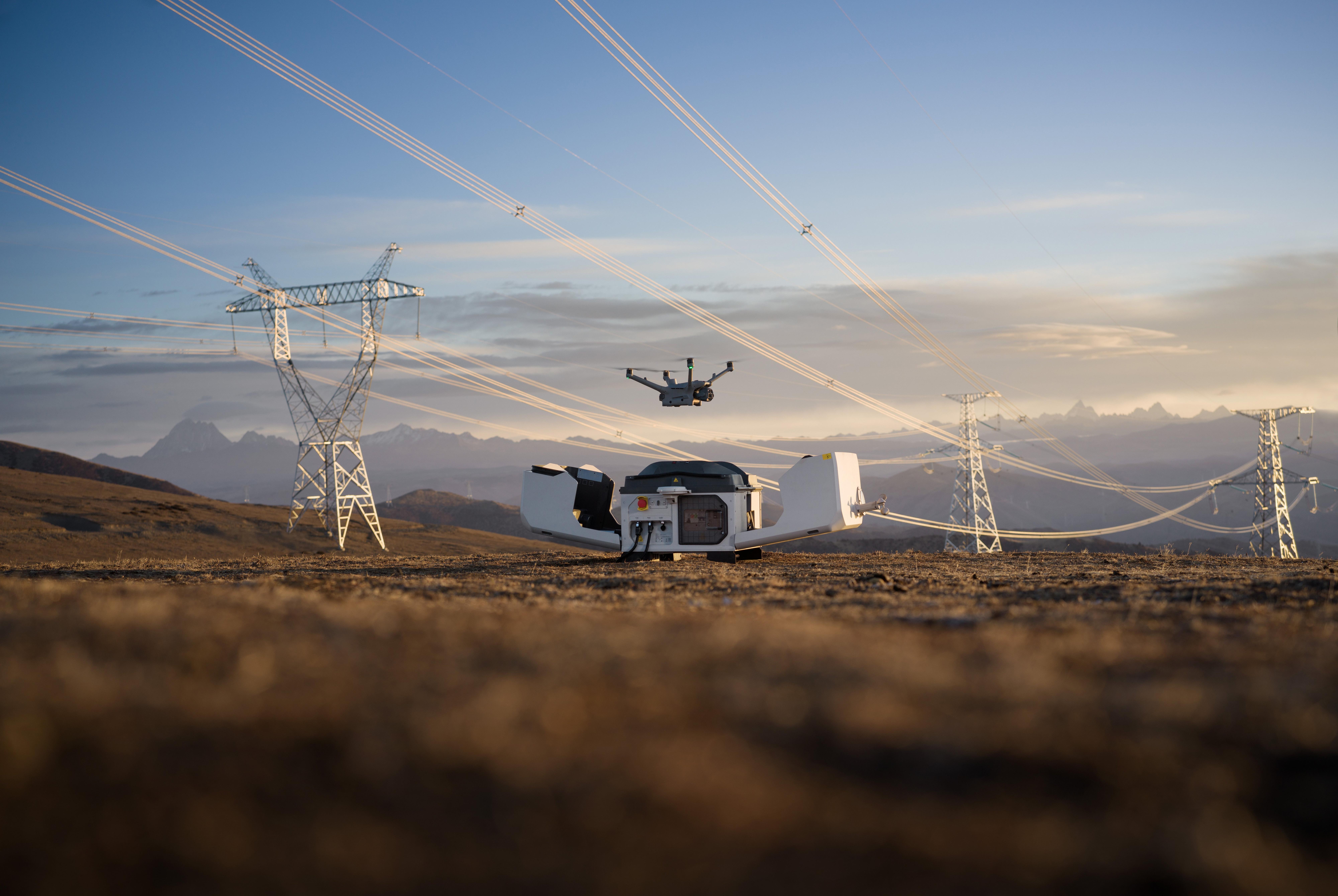 DJI dock and drone under powerlines